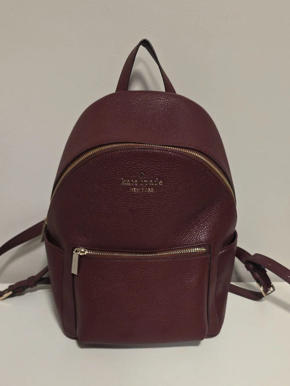 kate spade Leila Dome Leather Mini Backpack in Burgundy with Gold Hardware